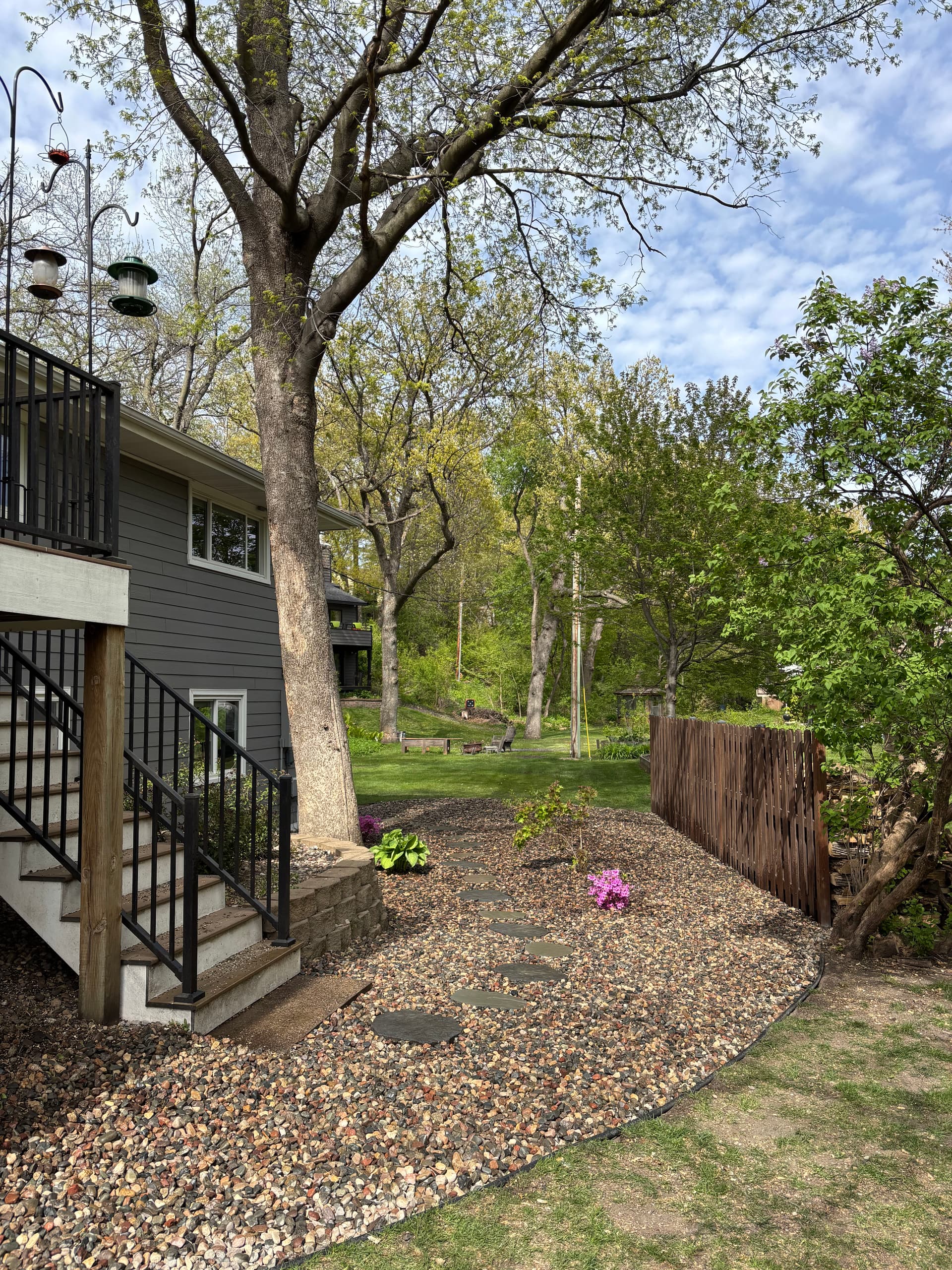 River Rock and Stone Steppers Give This Yard a Cleaner Look image