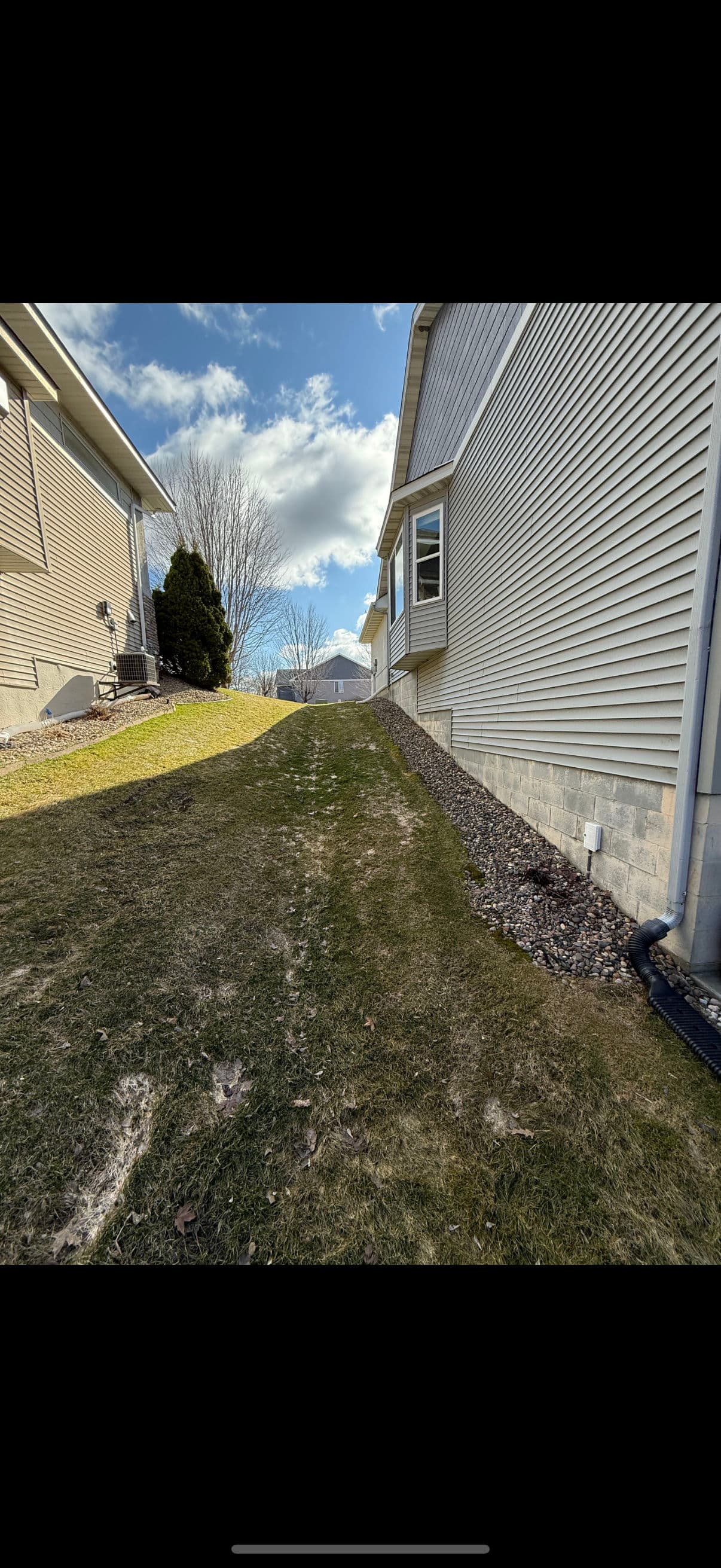 Gallery photos for Why New Construction Downspouts Need Proper Drainage Tie-Ins: Image #2
